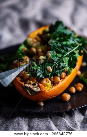 Stuffed Spaghetti Squash With Chickpeas And Garlicky Arugula Cream.selective Focus