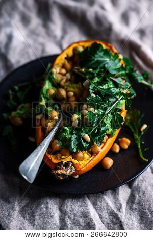 Stuffed Spaghetti Squash With Chickpeas And Garlicky Arugula Cream.selective Focus