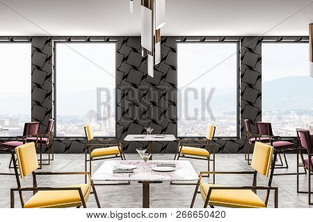 Interior Of Restaurant With Gray Geometric Pattern Walls, Concrete Floor, Yellow And Red Chairs Near