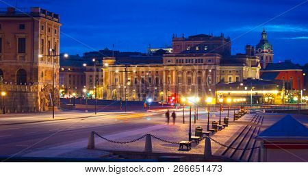 Night View Of Royal Opera House And Surrounding Buildings Seen From Skeppsbron, Stockholm, Sweden, E