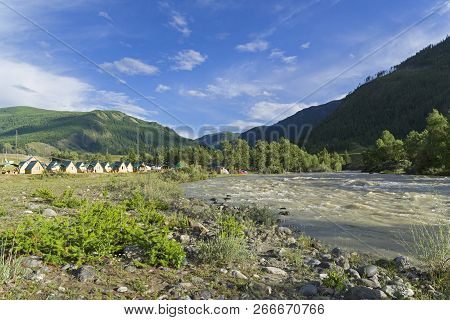 Camp Site On The Bank Of The Chuya River. The Neighborhood Of The Village Of Chibit, Altai, Russia.