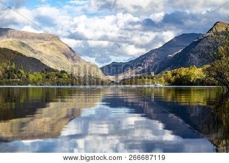 Reflections At Llyn Padarn With Dolbadarn Castle At Llanberis In Snowdonia National Park In Backgrou