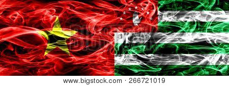 Socialist Republic Of Viet Nam Vs Abkhazia, Abkhazian Smoke Flags Placed Side By Side. Thick Colored