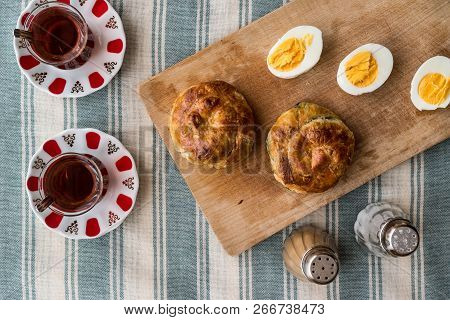 Turkish Borek Boyoz With Egg And Tea.