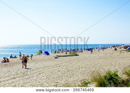 Anapa, Russia, August 19, 2017. A Lot Of People On The City Beach In The Place Where The River Anapk