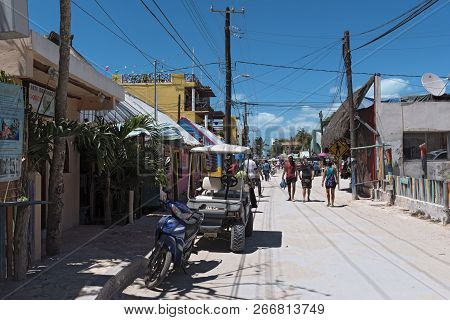 Sandy Road With Tourists And Stalls On Holbox Island, Quintana Roo, Mexico Located In North Yucatan