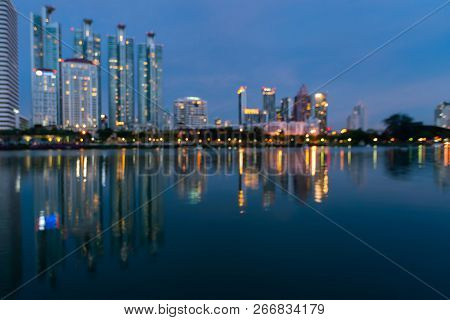 Night Twilight Blur Ligth City Office Building With Reflection, Abstract Background