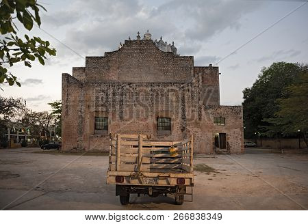 Valladolid, Mexico-march 20, 2018: Small Truck Behind The Cathedral De San Gervasio In The Old Town 