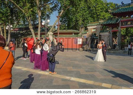 Foshan/china - 27 November 2015:unacquainted
Chinese Couple Takeing Pre-wedding Photo Infront Of Fos