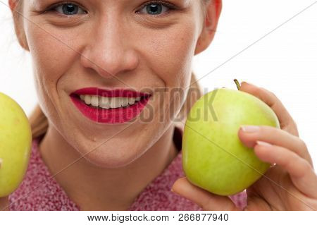 Close-up - Beautiful Young Woman With Perfect Tetth Holding Apples In Hands. Healthy Teeth, Whitenin