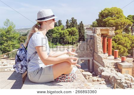 Young Woman Meditating Over Ancient Greece Landscape, Palace Of Minos At Knossos, Crete