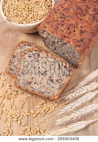 Multi-grain Bread On A Wooden Background. Healthy Food Concept.