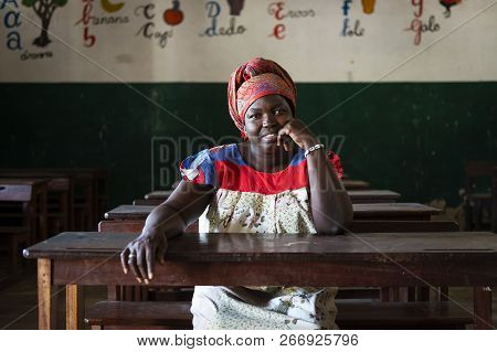 Orango Island, Guinea-bissau - February 3, 2018: Portrait Of A School Teacher Inside The Classroom I