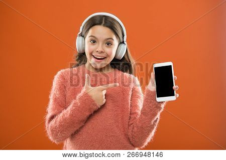 Best Music Apps That Deserve A Listen. Girl Child Listen Music Modern Headphones And Smartphone. Lis