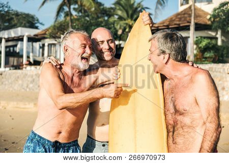 Seniors friends on the beach