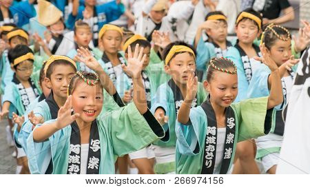 Tokyo, Japan - August 2018: Japanese Children Dancing Traditional Awaodori Dance In The Famous Koenj