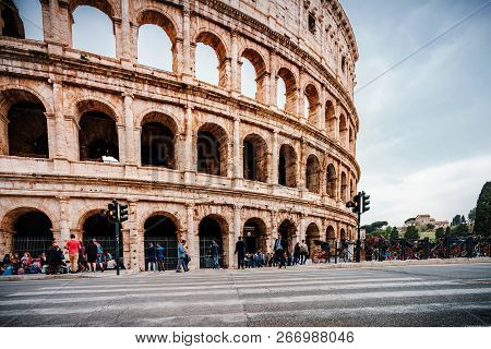 Roma, Italy - April 17, 2018: Colosseum And Tourists In Rome. Italy Capital Landmarks. Colosseum Or 