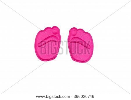 Soft Pink Orthopedic Insert For The Forefoot Under Fingers In Shoes Isolated On A White Background.
