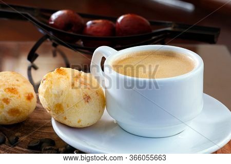 Brazilian snack cheese bread, pao de queijo, Brazilian snack cheese bread and a cup of coffee