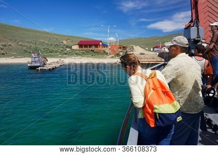 OLKHON ISLAND, 27 AUGUST, 2019: Passengers waiting the Ferry boat to Olkhon Island, Baikal Lake, Siberia, Russia