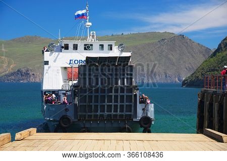 OLKHON ISLAND, 27 AUGUST, 2019: Passengers waiting the Ferry boat to Olkhon Island, Baikal Lake, Siberia, Russia