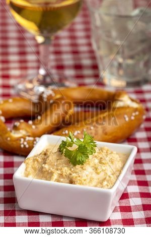 Bavarian Cheese Spread With A Pretzel And Wine