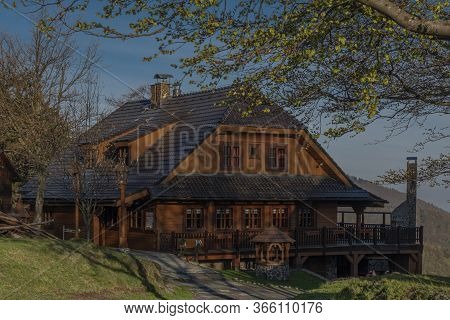 Wooden Building In Pustevny In Spring Sunny Nice Morning