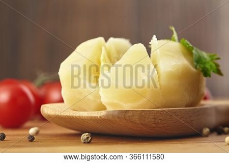 Boiled Potatoes In The Wooden Poon, Parsle Board Close Up