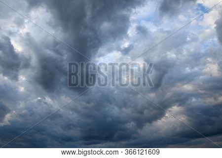 Stormy Sky With Storm Clouns On The Sunset With Beautiful Sun