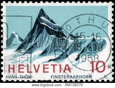 Saint Petersburg, Russia - May 05, 2020: Stamp Printed In The Switzerland With The Image Of The Fins