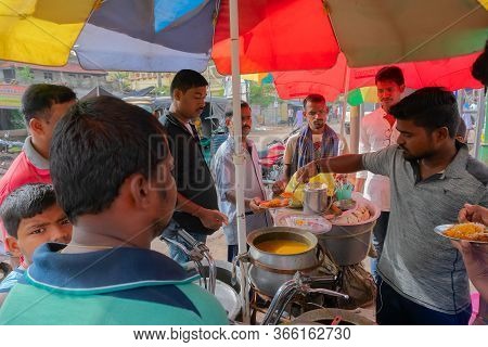 Cuttack, Odisha, India - 24th July 2019 : Dahi Bara Alu Dum Is Being Sold By Roadside Seller To Cust