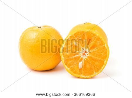 Fresh Oranges Full And Half Cut Rich In Vitamin C Isolated On White Background And Clipping Path