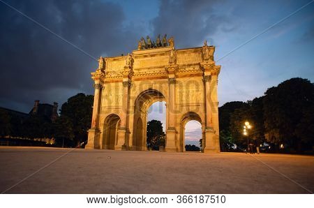 Arc de Triomphe du Carrousel in Paris at Dusk. France.