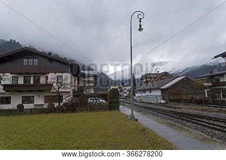 Low Cloud Cover The Mountains. Train Station In The Ski Resort Of Zell Am Ziller, Ziller Valley, Tyr