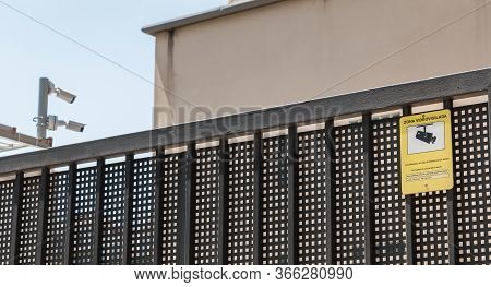 Barcelona, Spain - June 21, 2017: On A Metal Grid, Sign Written In Catalan: Video Vigilance Zone (zo