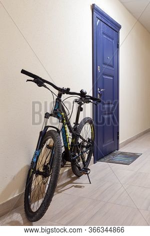 Russia. Krasnodar On April 24, 2020. At The Door Of The House Is A Bicycle.