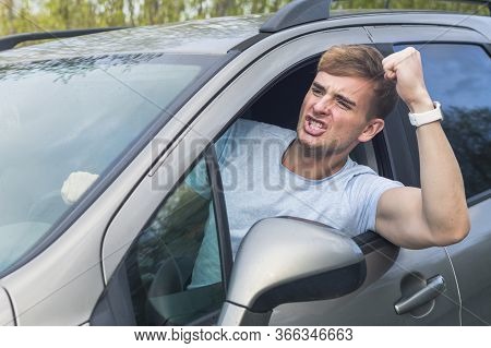 Angry Aggressive Guy, Young Emotional Irritated Man Driver Screaming, Shouting, Yelling While Drivin