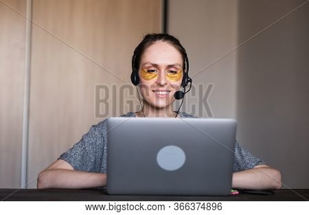 Close Up - Portrait Of Smiling Positive Woman Working In Home Use Headset, Customer Service Represen