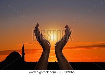 Muslim Man Praying Outdoors At Sunrise, Closeup