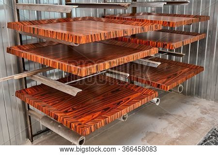 Wooden Wall Panels. Rosewood Fineline Veneer Wall Panels In The Spray Booth. Furniture Manufacturing