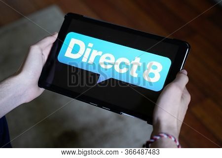 Bordeaux , Aquitaine / France - 03 03 2020 : Direct 8 On Tablet Screen In Man Hands Private National