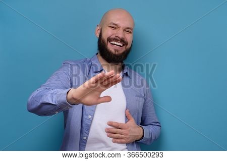 Man Bursting Into Laughing Holding His Hands On Stomach Laughing