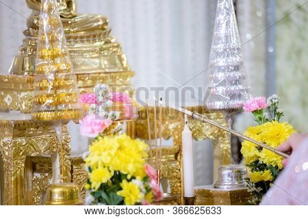 Incense Was Lit By The Fire Of Red Candle. Incense. Incense And Smoke For Worship. Incense Candles F