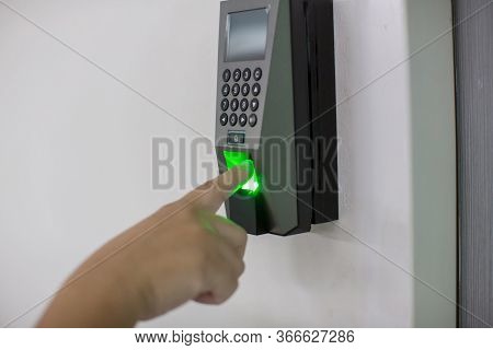 Finger Scan On Machine Security Concept And Safety. Soft Focus On Hand Scanning Finger On Machine Co