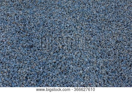 Stones Texture And Background. Rock Texture . Crushed Gravel Background. Seamless Texture Of Gravel 