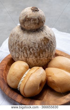 Italian Semi Hard Handmade Smoked Scamorza And Caciocavallo Matured In Caves Cheeses Made From Cow M
