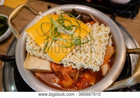 Korean food of army stew or army base stew (Budae Jjigae) in the restaurant