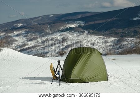 Sicily adventure in winter tent with snowshoes on snow in Nebrodi Mountains natural landmark
