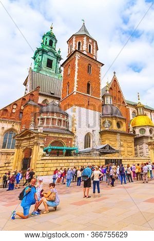 Krakow, Poland -june 18, 2019: Wawel Royal Castle Colorful View And People Takling Photo