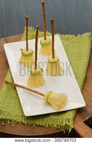 Snack Cheese And Salt Sticks Broomsticks On Plate